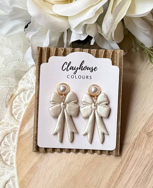 CC Pearl White Bow Earrings